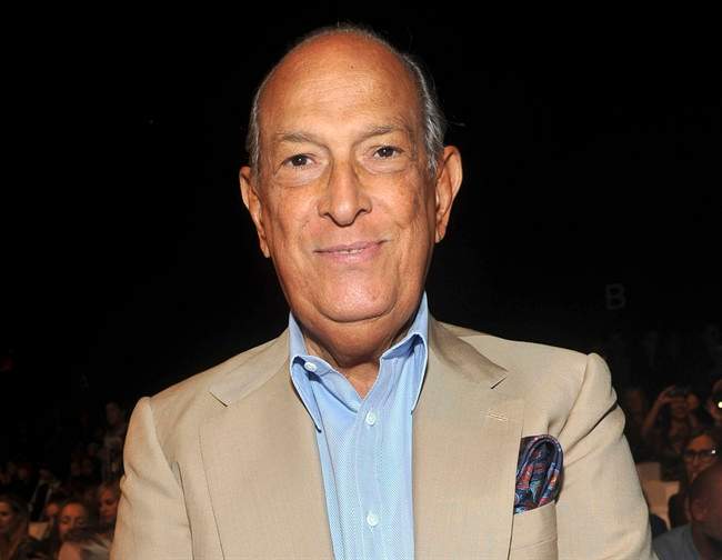 FILE - In this Sept. 11, 2011 file photo, designer Oscar de la Renta attends the Diane von Furstenberg Spring 2012  fashion show during Fashion Week in New York. Luminaries of the fashion and entertainment worlds were attending a private funeral Monday, Nov. 3, 2014, for legendary fashion designer Oscar de la Renta in New York. De la Renta died Monday, Oct. 21, 2014 at age 82. 