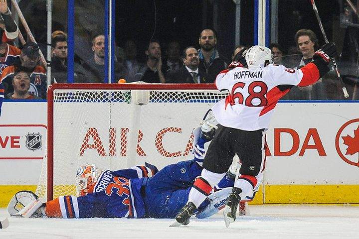 Mike Hoffman #68 of the Ottawa Senators celebrates after scoring the game-winning goal in overtime against Ben Scrivens #30 of the Edmonton Oilers during an NHL game at Rexall Place on November 13, 2014 in Edmonton, Alberta, Canada.