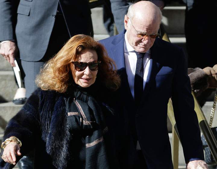 Diane von Furstenberg, left, and her husband Barry Diller, right, the Church of St. Ignatius Loyola on Manhattan’s Upper East Side after a private funeral for Oscar De la Renta, Monday, Nov. 3, 2014, in New York.