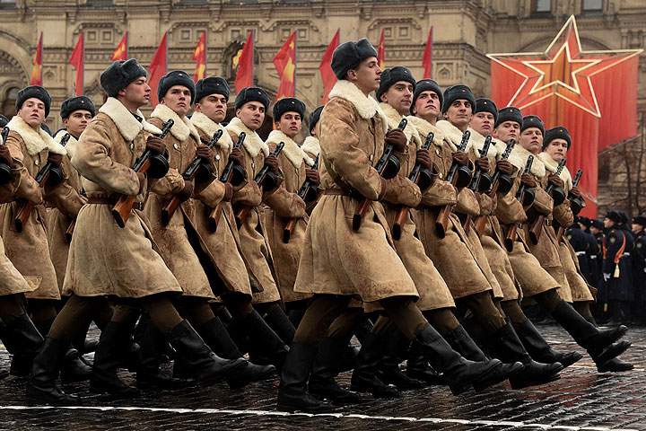 Wearing the World War II-era uniform of the Red Army troops, Russian soldiers take part in the military parade on the Red Square in Moscow on November 7, 2014.