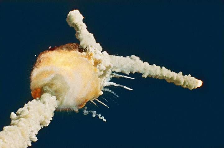 The space shuttle Challenger explodes shortly after lifting off from Kennedy Space Center in this Jan. 28, 1986 file photo.