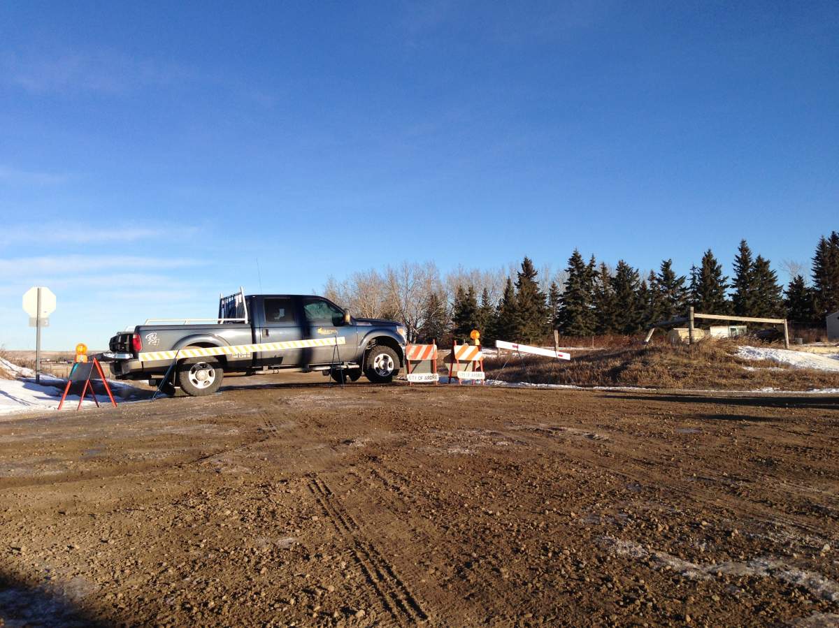Road closed at Range Road 12 & Township Road 264 because of leak at sour gas well.