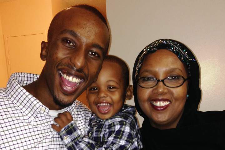 Suryan Giama with his mother and son.