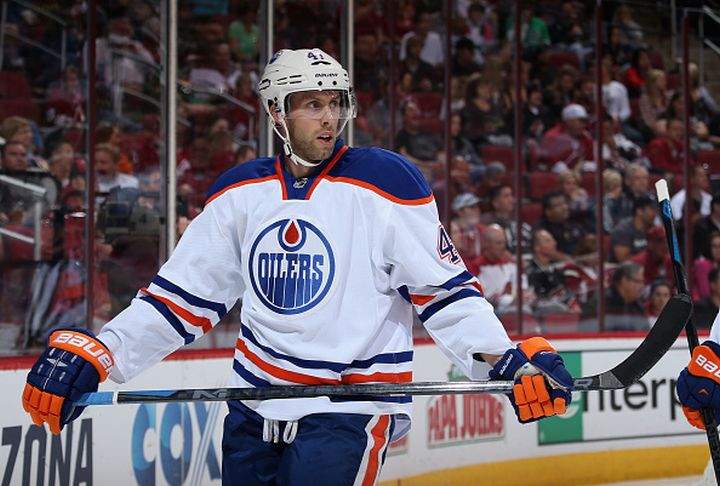 The Edmonton Oilers have acquired centre Kellan Lain from the Vancouver Canucks in exchange for centre Will Acton.
