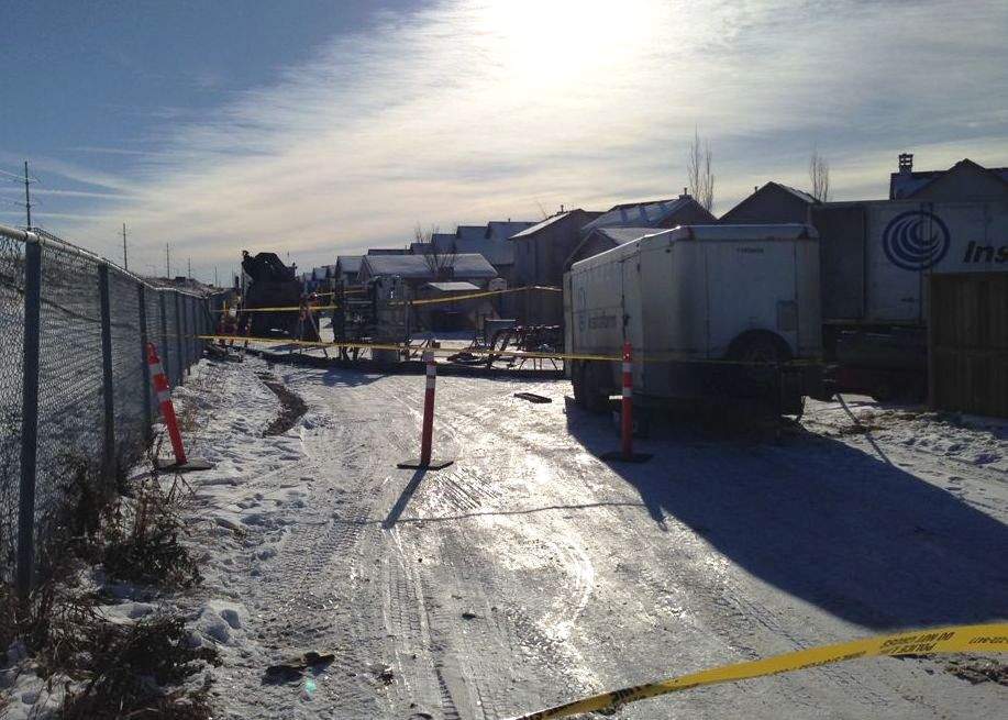 Emergency crews were called to an alley in the 100 block of Cranberry Square S.E. on Tuesday. 