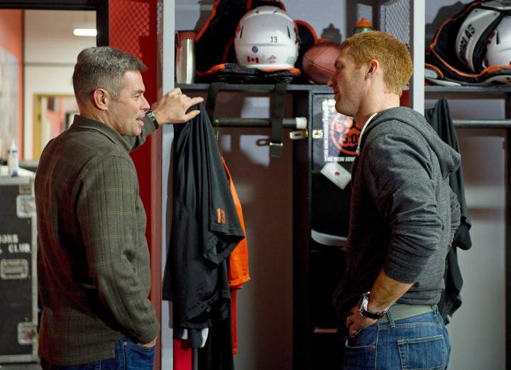 B.C. Lions quarterback Travis Lulay (right) and Jacques Chapdelaine Offensive Coordinator and Quarterbacks Coach talk during the team's last media availability at the team's practice facility in Surrey, B.C., November 20, 2012.