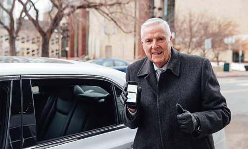 Bill Smith is the first UberX passenger in Edmonton. Dec. 18, 2014