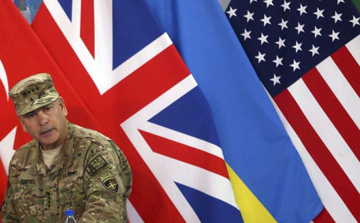 Commander of the International Security Assistance Force Gen. John Campbell speaks during a ceremony to mark the United States and NATO formally ending their war in Afghanistan on Sunday, Dec. 28, 2014 in Kabul.