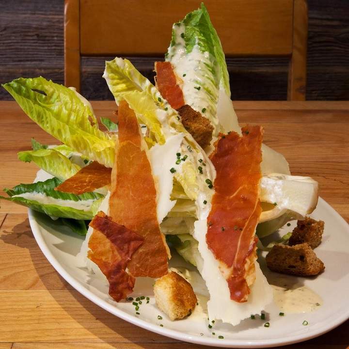 Les Enfants Terribles’ on Bernard St. serves Pierre Karl Péladeau’s “comfort dish,” this Caesar Salad. For him, spare the prosciutto crisps please. Courtesy: Facebook.