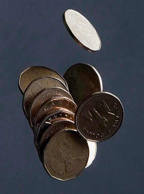 The loonie has slid in tandem with declining oil prices.