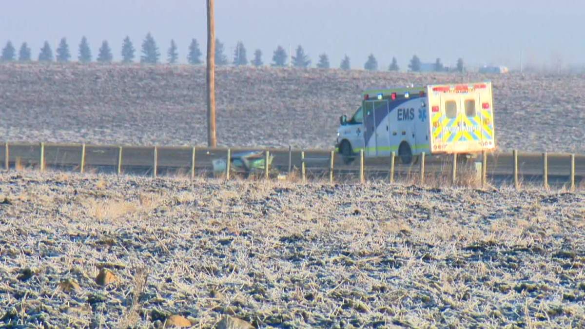 RCMP rush to the scene of a fatal crash on Highway 2A near Township Road 292, on Monday, December 15th, 2015. 