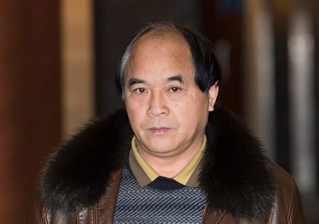 Diran Lin, father of Jun Lin, is shown at the Montreal Courthouse on the sixth day of jury deliberations in the murder trial for Luka Magnotta, December 21, 2014. 
