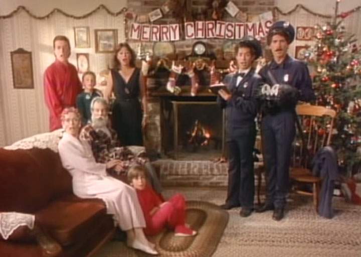A scene from the video for 'Grandma Got Run Over By a Reindeer' by Elmo and Patsy.