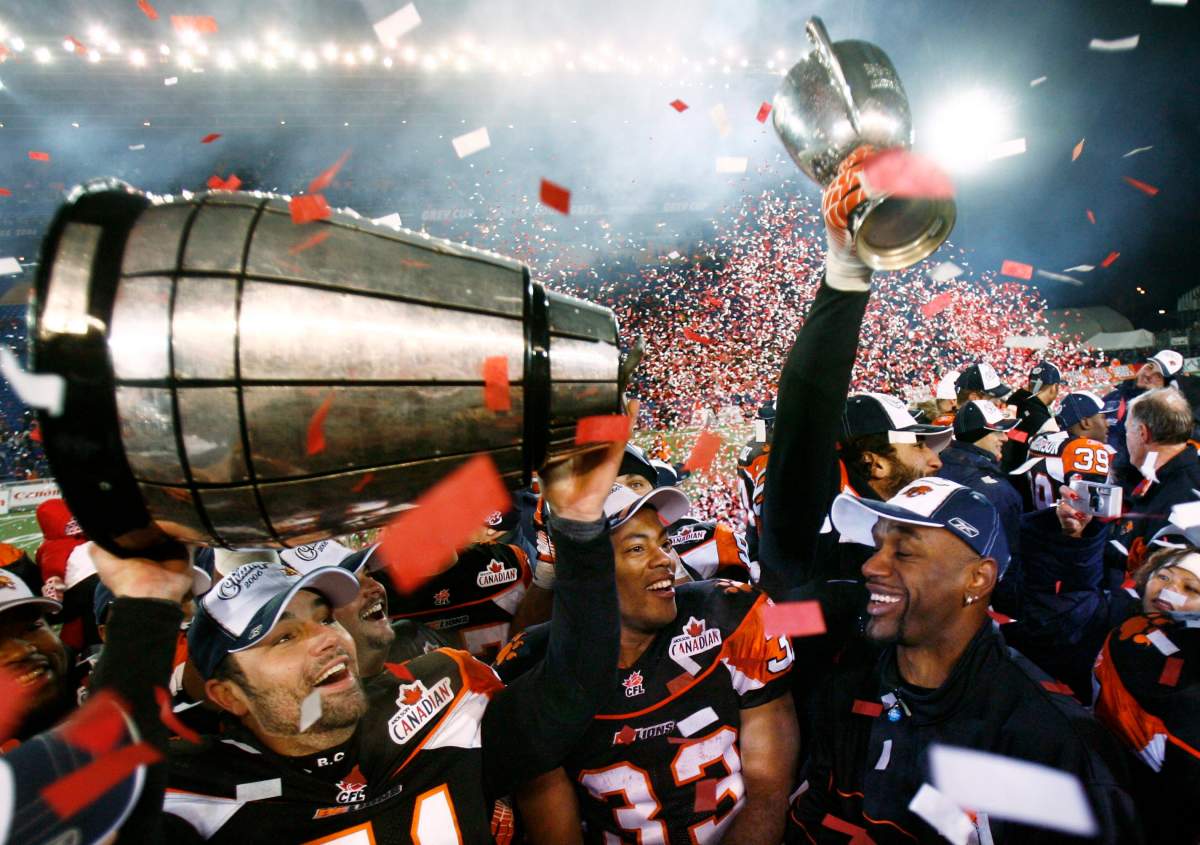 B.C. Lions players celebrate after winning the Grey Cup in Winnipeg