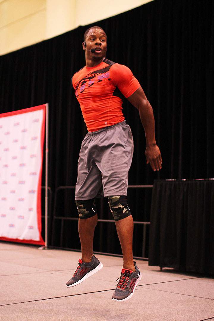 Fitness Expert Tommy Europe leads participants in a HIIT workout during the 2014 canfitpro fitness conference in Toronto.