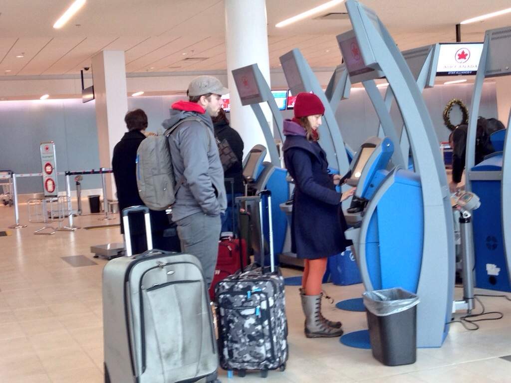 Travelers check in at the Halifax Stanfield International Airport.