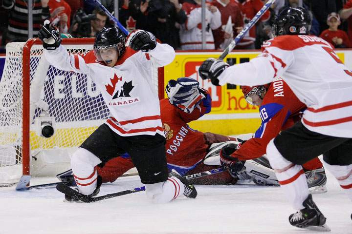 Jordan Eberle #14 of Team Canada reacts after having scored the tying goal on Vadim Zhelobnyuk #1 of Team Russia forcing overtime during the semifinals at the IIHF World Junior Championships at the Ottawa Civic Centre on January 03, 2009 in Ottawa, Ontario, Canada. Team Canada defeated Team Russia 6-5 in a shootout.