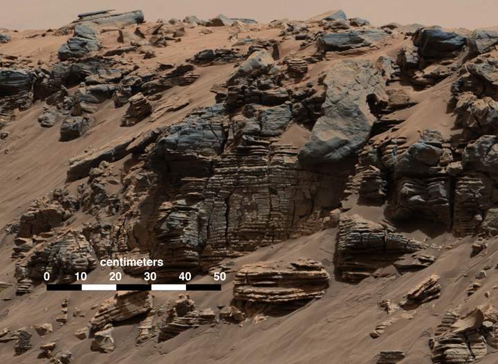 This evenly layered rock photographed by the Mast Camera (Mastcam) on NASA’s Curiosity Mars Rover on Aug. 7, 2014, shows a pattern typical of a lake-floor sedimentary deposit not far from where flowing water entered a lake.