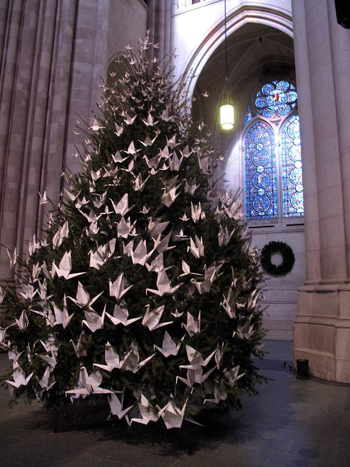 This undated photo provided by The Cathedral of St. John the Divine shows the cathedral’s peace tree, which is decorated with paper cranes. The tree is a Christmas tradition at the St. John the Divine, which is the largest Gothic cathedral in the world.