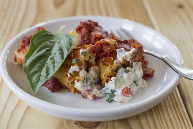 This Nov. 17, 2014 photo shows lobster manicotti fra diavolo in Concord, N.H. If lobster is too much trouble, or not in the budget, just substitute cooked and peeled shrimp. 
