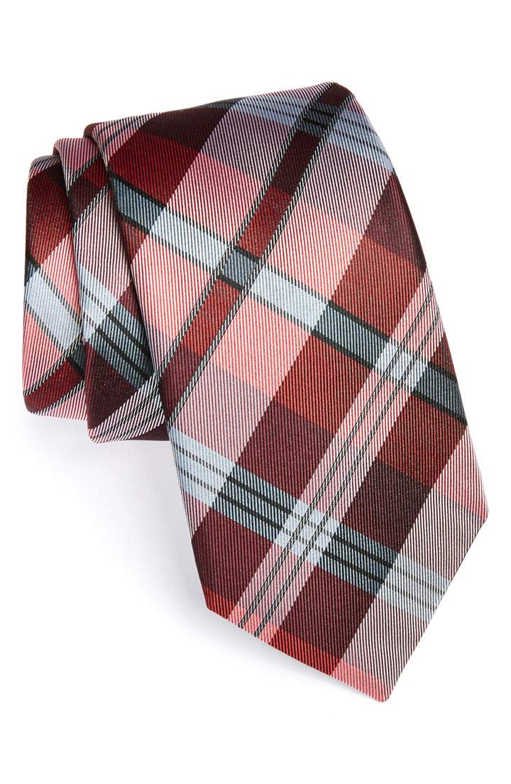 This photo provided by Michael Kors shows a tie. Marsala, the wine-influenced, red-kissed color of 2015, was chosen by Pantone. Pantone's yearly picks can herald a marked presence of a color in fashion, beauty, housewares, home design and consumer packaging, though some years the influence is stronger than others.
