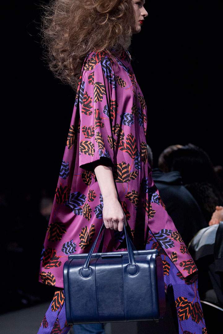In this Feb. 11, 2013 file photo, a model walks the runway during the Marc by Marc Jacobs Fall 2013 fashion show during Fashion Week, in New York. Orchid is growing on us: A version of the purple hue is Pantone Inc.’s color of the year for 2014.