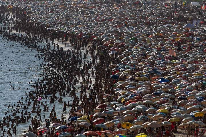 People enjoy Ipanema beach in Rio de Janeiro, Brazil, on January 4, 2014.