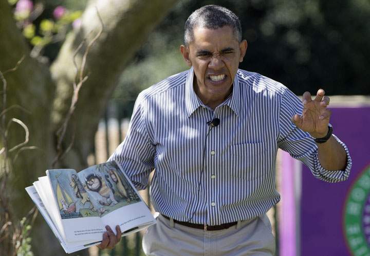 Barack Obama makes a face as he reads “Where the Wild Things Are” during the White House Easter Egg Roll on Monday, April 21, 2014.