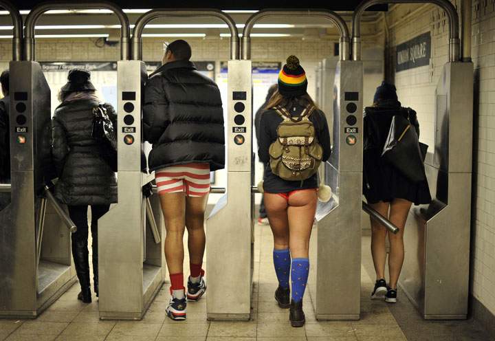 Some riders enter the New York subway in their underwear as they take part in the 2014 No Pants Subway Ride on January 12, 2014.