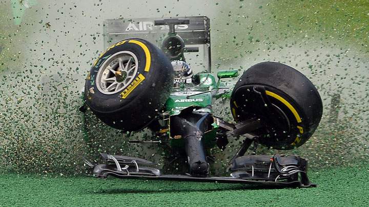 Kamui Kobayashi veers off the track during an accident at the start of the Formula One Australian Grand Prix in Melbourne on March 16, 2014.