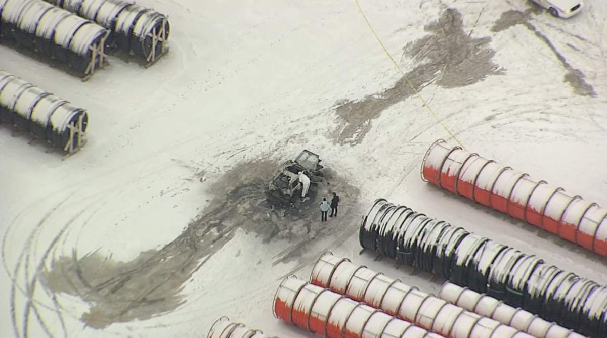 RCMP investigate a suspicious death in Strathcona County where a man was found with a gunshot wound and vehicle was found on fire, Tuesday, Dec. 30, 2014. 