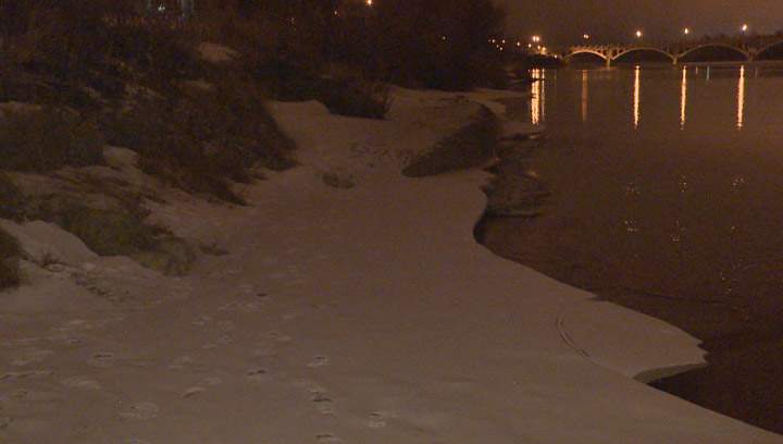 Saskatoon police make daring rescue from the South Saskatchewan River; pull woman from the icy water.