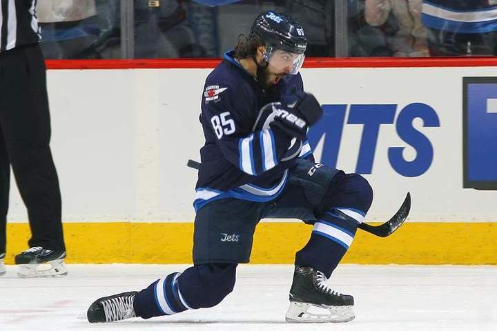 Mathieu Perreault celebrates his second goal of the game during the first period against the Florida Panthers on Tuesday at the MTS Centre in Winnipeg.