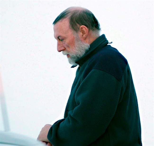 Eric Dejaeger leaves an Iqaluit, Nunavut courtroom Jan. 20, 2011. THE CANADIAN PRESS/Chris Windeyer.