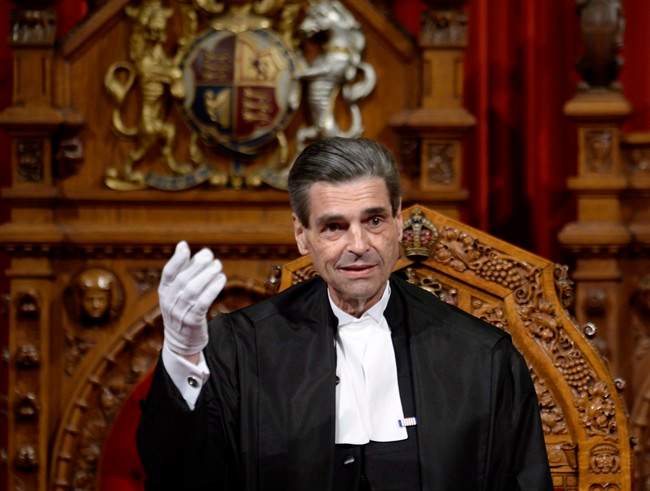 Quebec Sen. Pierre Claude Nolin sits in the Senate chamber in Ottawa, Thursday Nov.27, 2014 after being named the new Speaker of the Senate. Adrian Wyld/ The.