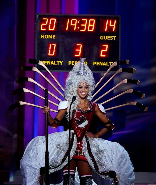 Miss Canada, Chanel Beckenlehner poses for the judges during the national costume show during the 63rd annual Miss Universe Competition in Miami, Fla., Wednesday, Jan. 21, 2015.