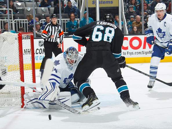 Melker Karlsson #68 of the San Jose Sharks looks for a rebound against James Reimer #34 of the Toronto Maple Leafs during an NHL game on January 15, 2015 at SAP Center in San Jose, California. 