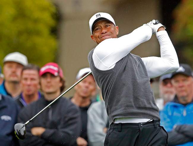 Tigers Woods tees off on the fifth hole during the second round of the Phoenix Open golf tournament, Friday, Jan. 30, 2015, in Scottsdale, Ariz.
