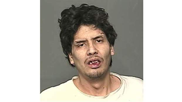Mitchell Dean Beardy, as seen in a mugshot from 2014.