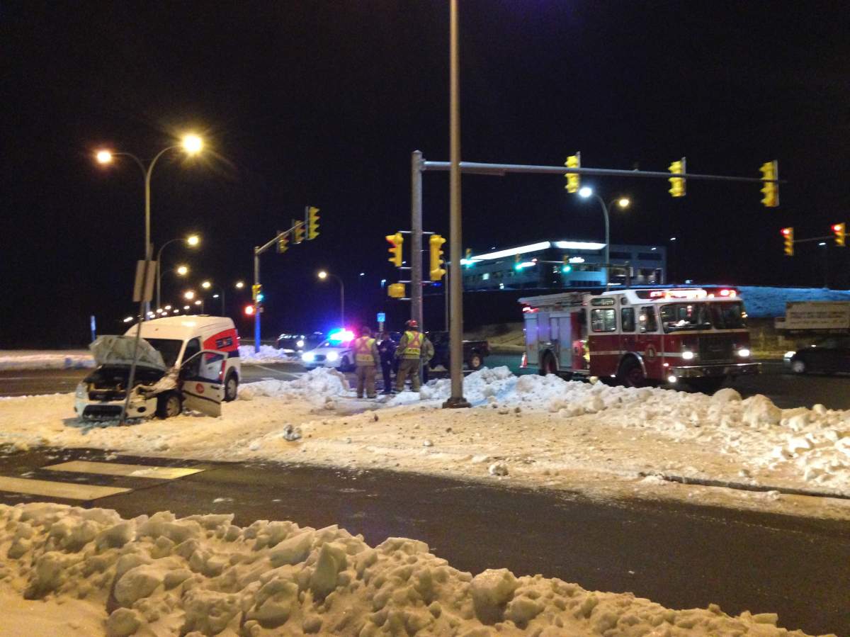 A Canada Post van hit a traffic sign after colliding with a pickup truck at Burnside Dr. and Wright Ave. 