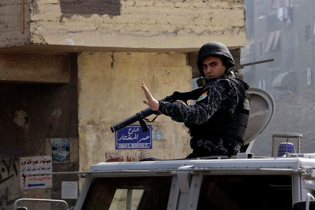 Egyptian security forces deploy in the Cairo suburb of Matariyah, Egypt, Sunday, Jan. 25, 2015.