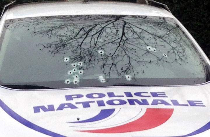 A photo taken on January 7, 2015 shows a police car riddled with bullets during an attack on the offices of the newspaper Charlie Hebdo in Paris which left eleven dead, including two police officers.