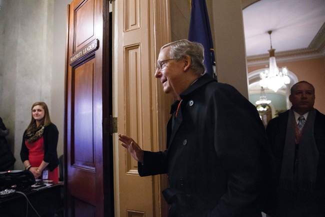 Senate Majority Leader Mitch McConnell of Ky. arrives for work on Capitol Hill in Washington, Monday, Jan. 12, 2015, as the Republican-controlled Senate is moving ahead on a bill to construct the Keystone XL pipeline despite President Barack Obama's veto threat. The House approved the bill last Friday.