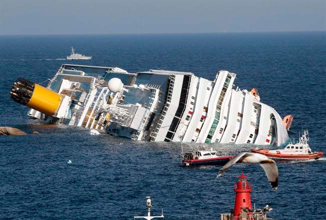  In this file photo taken on Jan. 14, 2012, the luxury cruise ship Costa Concordia lays on its side after running aground the tiny Tuscan island of Giglio, Italy.