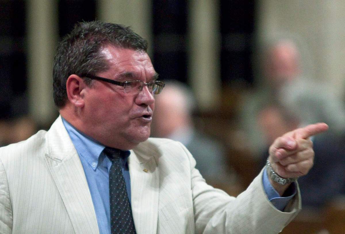 Bloc Quebecois whip Michel Guimond speaks in the House of Commons on Parliament Hill in Ottawa on June 2, 2010. 