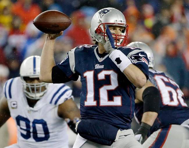 New England Patriots quarterback Tom Brady looks to pass during the first half of the NFL football AFC Championship game against the Indianapolis Colts in Foxborough, Mass. on Jan. 18, 2015.