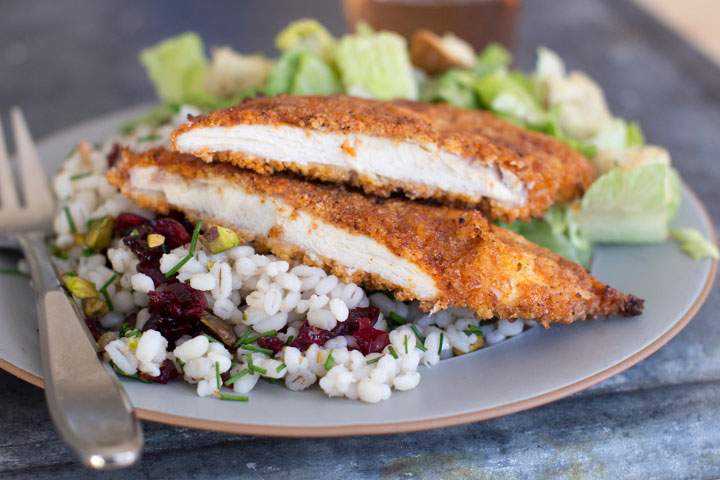 This Jan. 5, 2015, photo shows sweet-and-spicy panko-crusted chicken in Concord, N.H. While the breaded cutlets can be pan-fried, you can also use the ease of the oven.