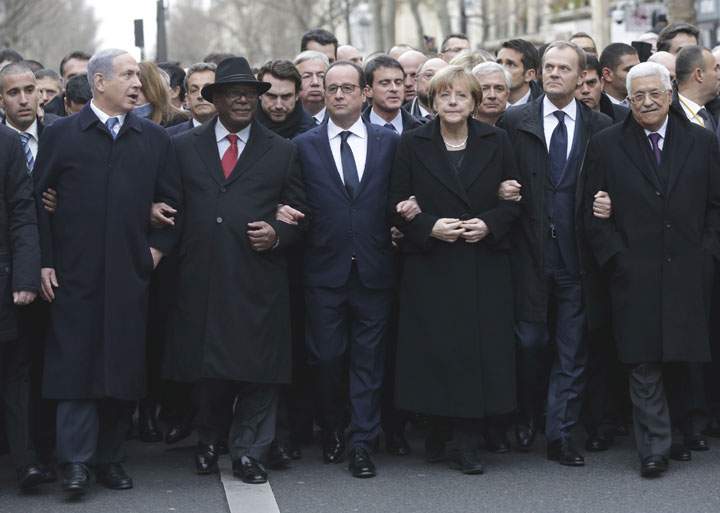 From the left, Israeli Prime Minister Benjamin Netanyahu, Malian President Ibrahim Boubacar Keita, French President Francois Hollande, German Chancellor Angela Merkel, EU president Donald Tusk and Palestinian Authority President Mahmoud Abbas march during a rally in Paris, France, Sunday, Jan. 11, 2015. 