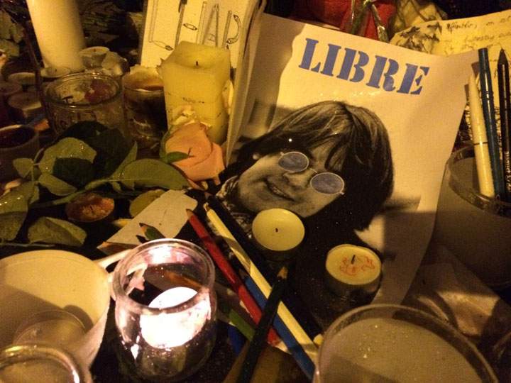 A photo of a young Jean Cabut, one of the murdered Charlie Hebdo cartoonists, at a memorial in Paris.