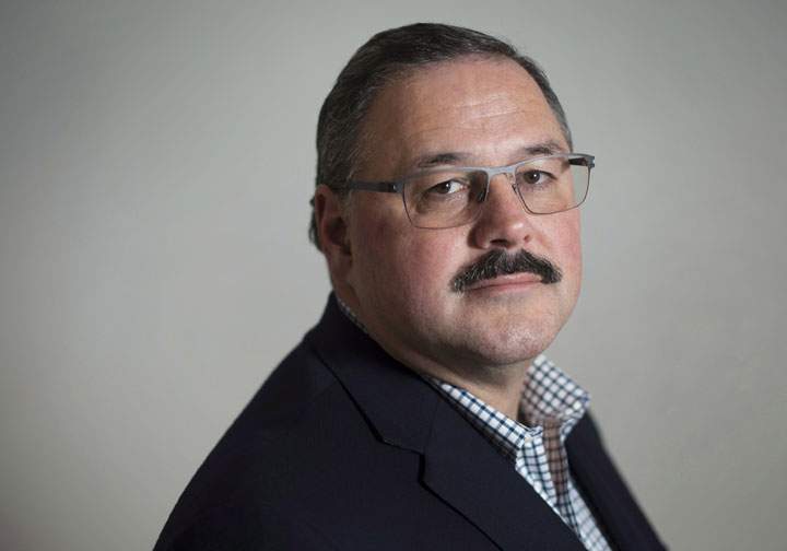 Ronald Boire, acting CEO of Sears Canada, poses at the company's headquarters in Toronto on Wednesday, November 12, 2014. 